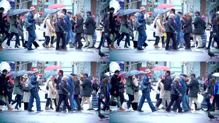 雨天下雨撑伞十字路口城市都市行人打伞打着伞雨季