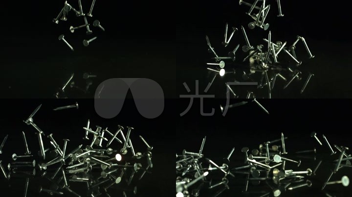 掉落的铁钉慢动作掉落的物体黑背景