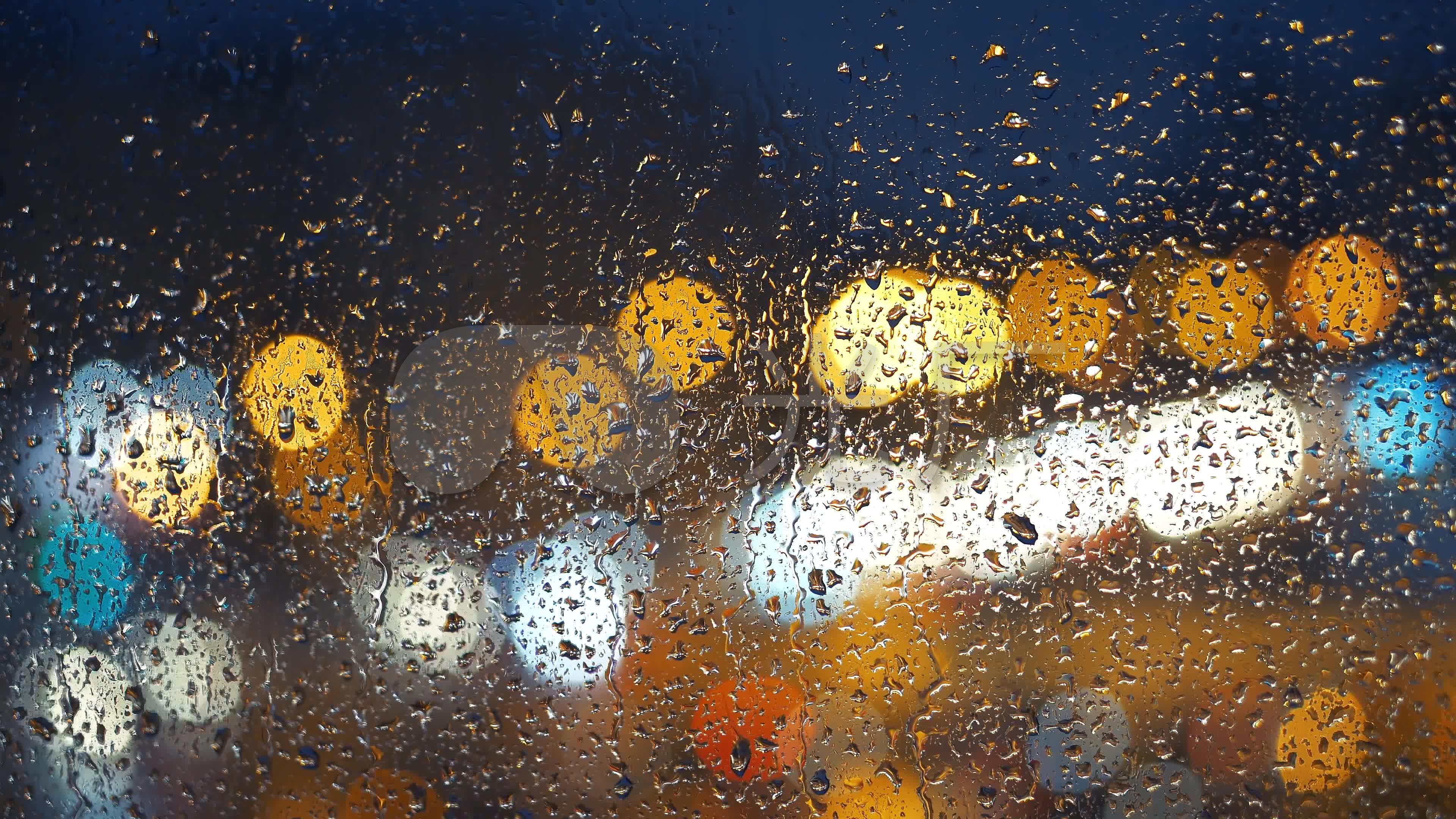 4k雨水玻璃外的霓虹光斑_3840x2160_高清视频素材下载