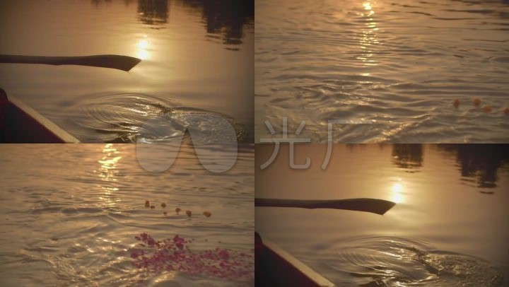 湖水划船划桨小船湖面花瓣漂流夕阳唯美夕阳湖黄昏水面