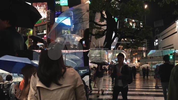 雨天日本街道上撑伞行走的人群