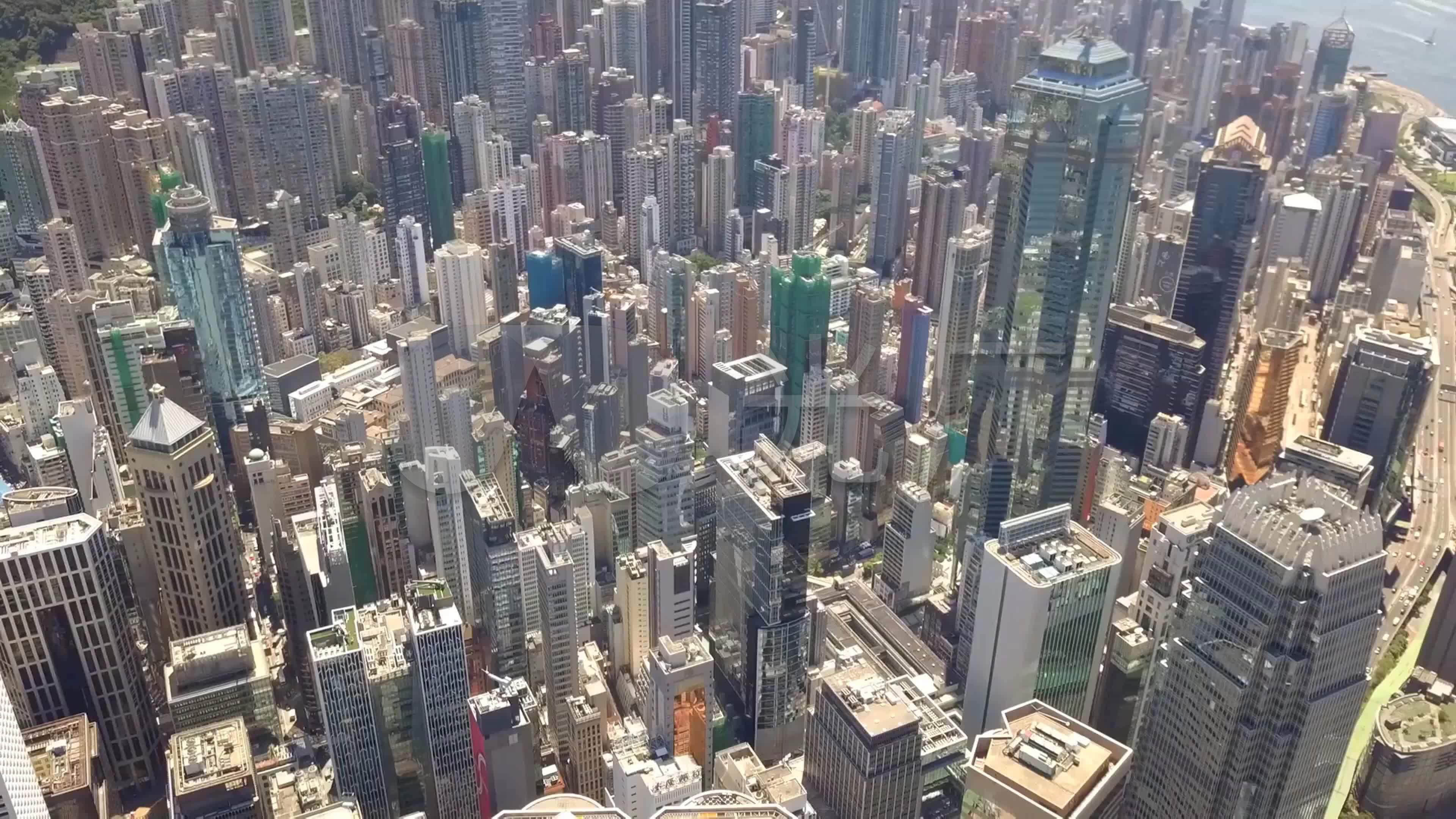 航拍香港沿岸半岛楼宇港口维多利亚港中环_3840x2160
