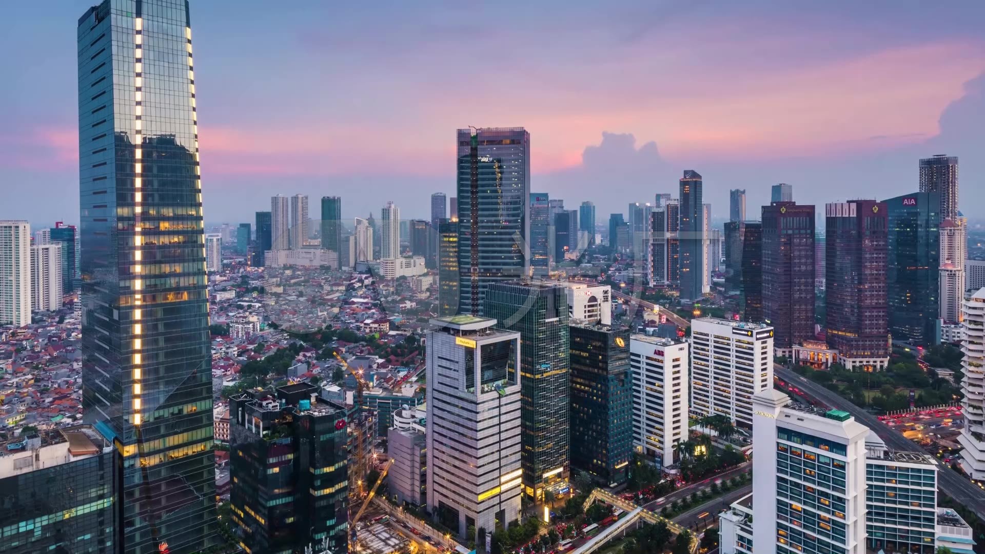 印尼雅加达楼宇街道车流夜景市区延时摄影_1920x1080