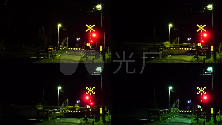 夜晚铁路道口红色信号灯火车通过