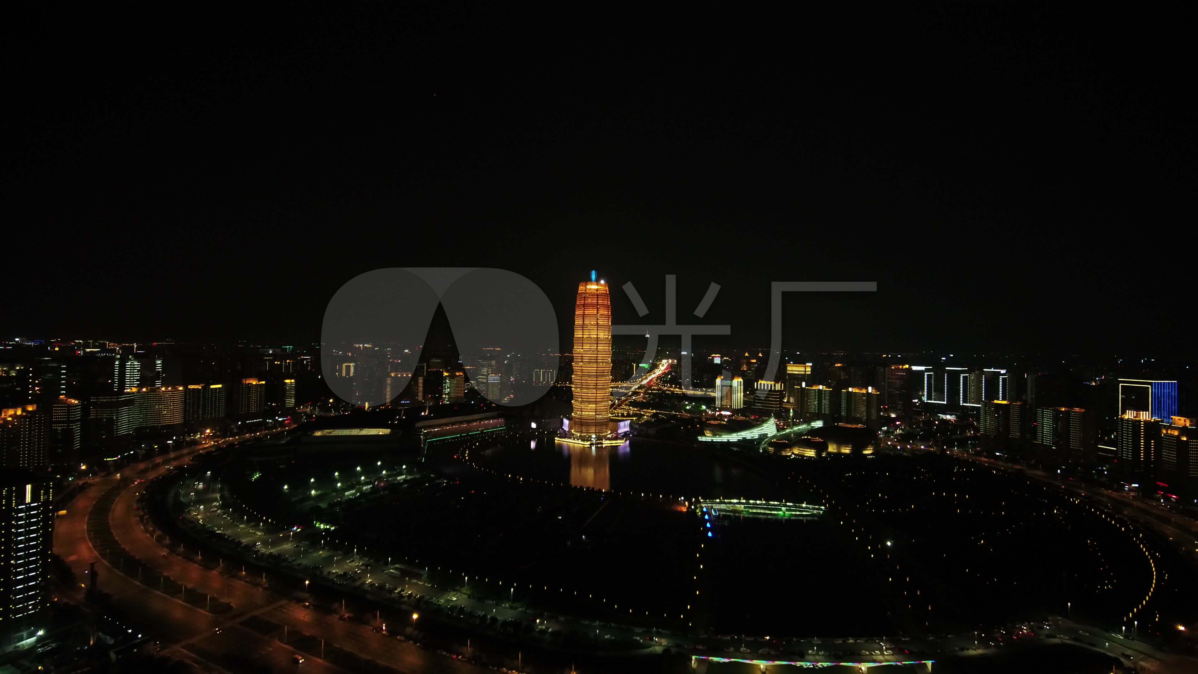 4k郑州城市cbd大玉米会展中心夜景航拍