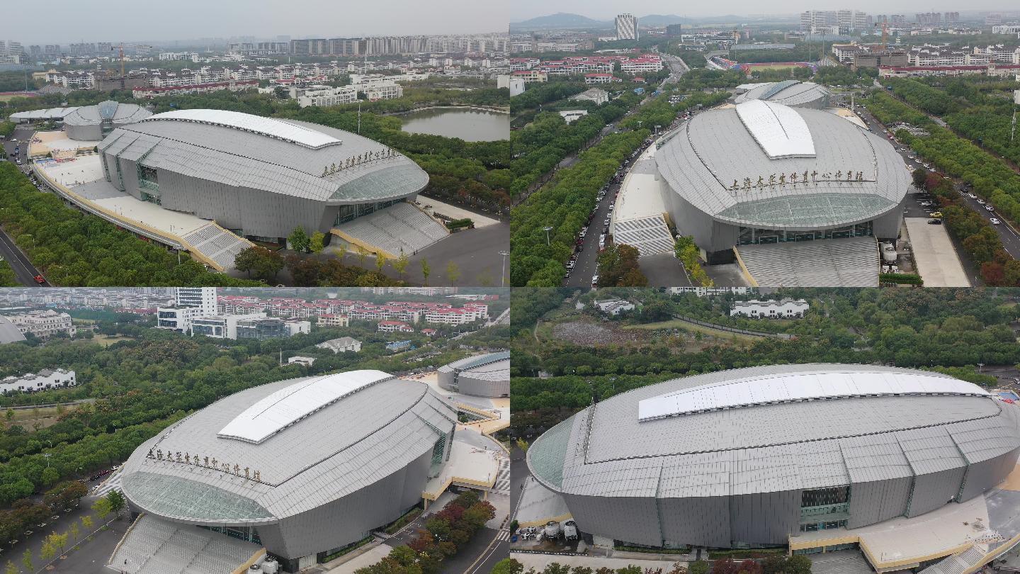 航拍的上海城市旅游地标建筑——松江大学城上海大学生体育中心体育馆