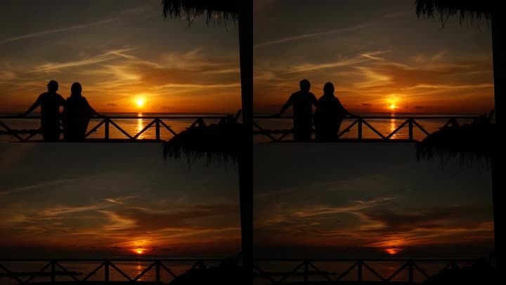 浪漫夕阳黄昏湖畔情侣
