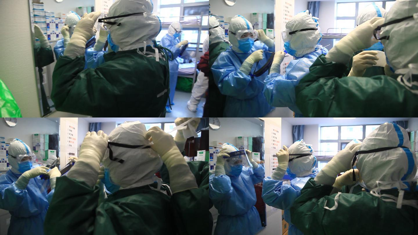 武汉同济医院中法新城院,抗击新冠病毒的医生穿戴隔离服,进icu病区前