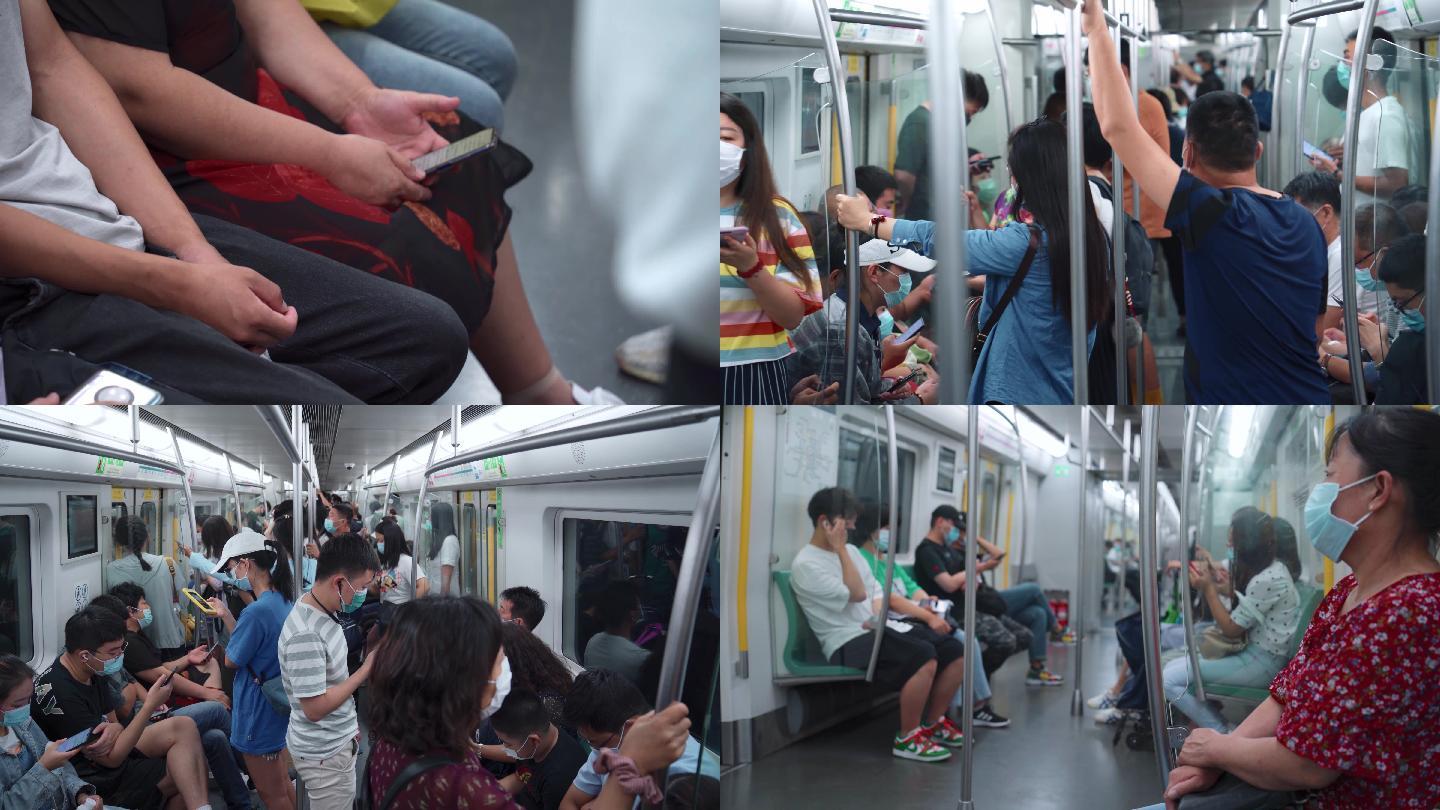 地铁城市上班族口罩疫情防疫年轻人老人乘坐地铁交通市民看手机冷漠