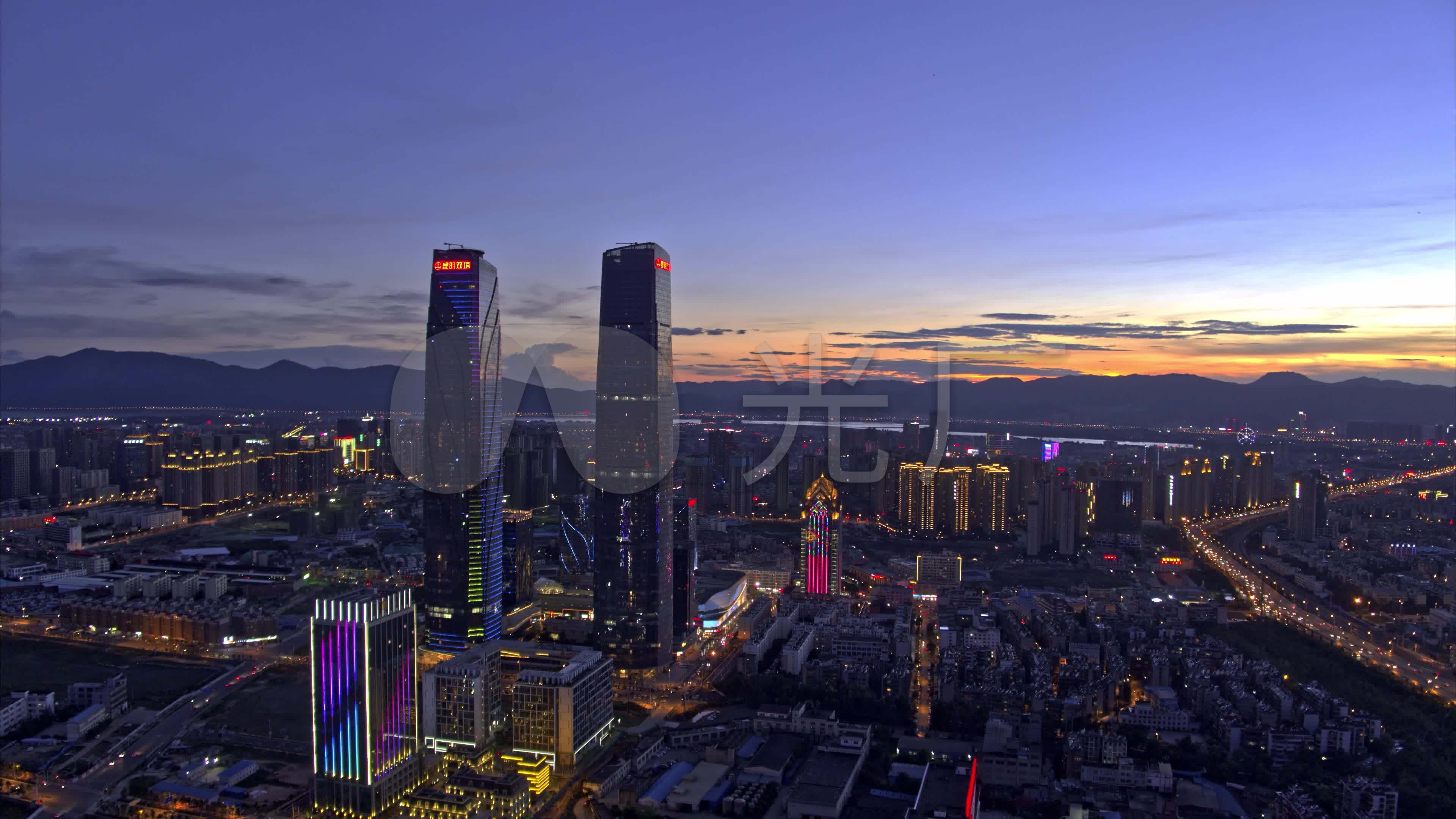 城市建筑大厦高楼云南昆明万达夕阳_3840x2160_高清视频素材下载(编号