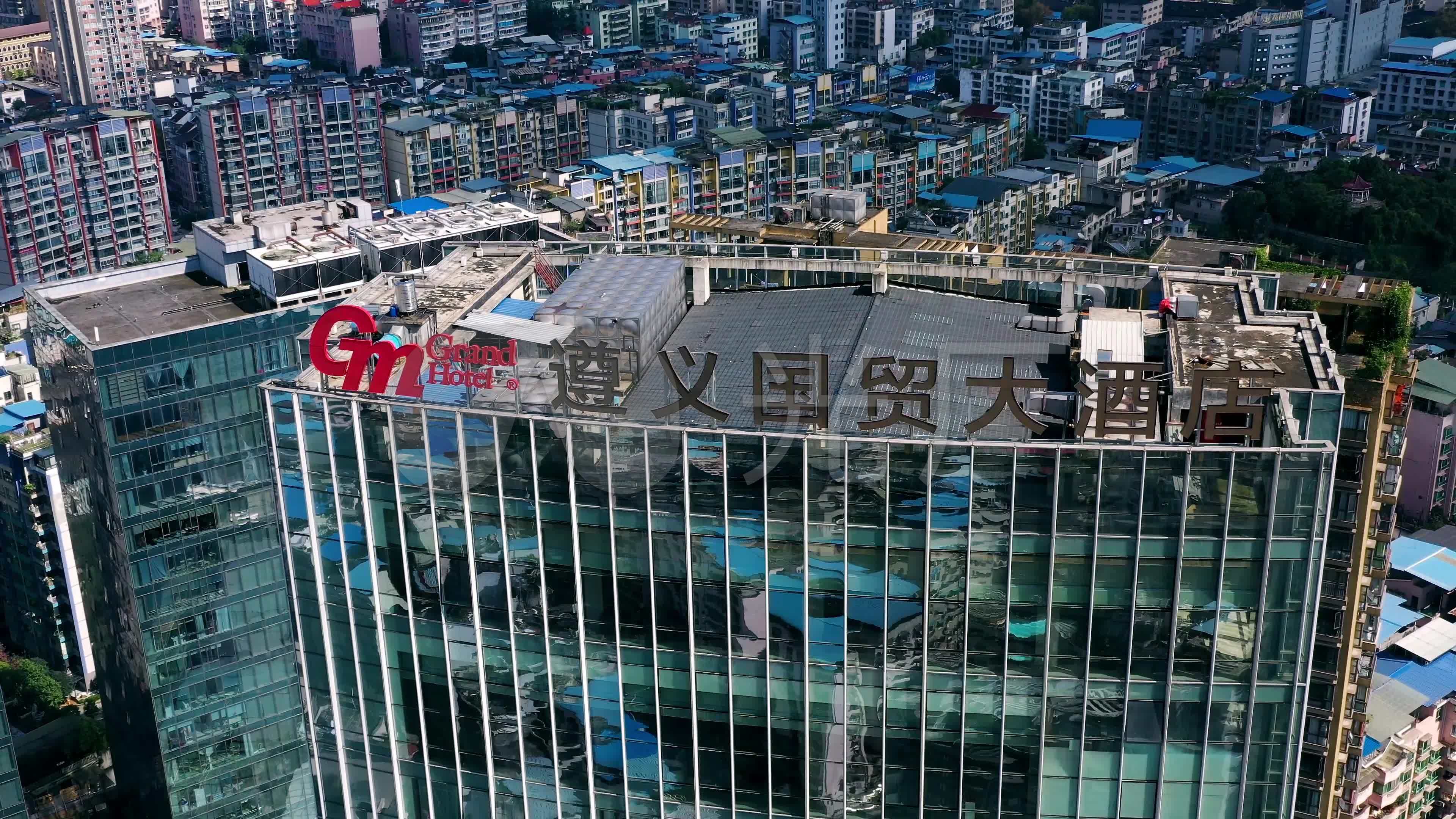 4k航拍遵义国贸大酒店珠海路_3840x2160_高清视频素材下载(编号