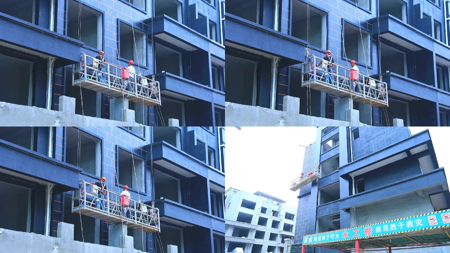 建筑工地外墙施工农民工工人高空作业建筑工人工地辛苦工作蜘蛛人