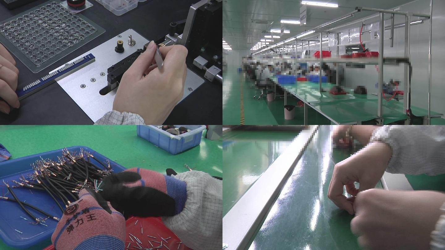 现代电子仪器生产车间流水线工人在工作