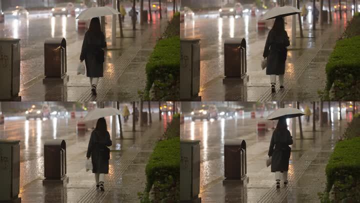 雨中下雨打伞撑伞女孩女性雨季下雨天天气雨中街道行人
