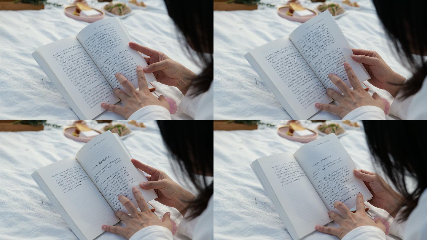 公园美女趴着看书4k视频_3840x2160_高清视频素材下载(编号:5809274)