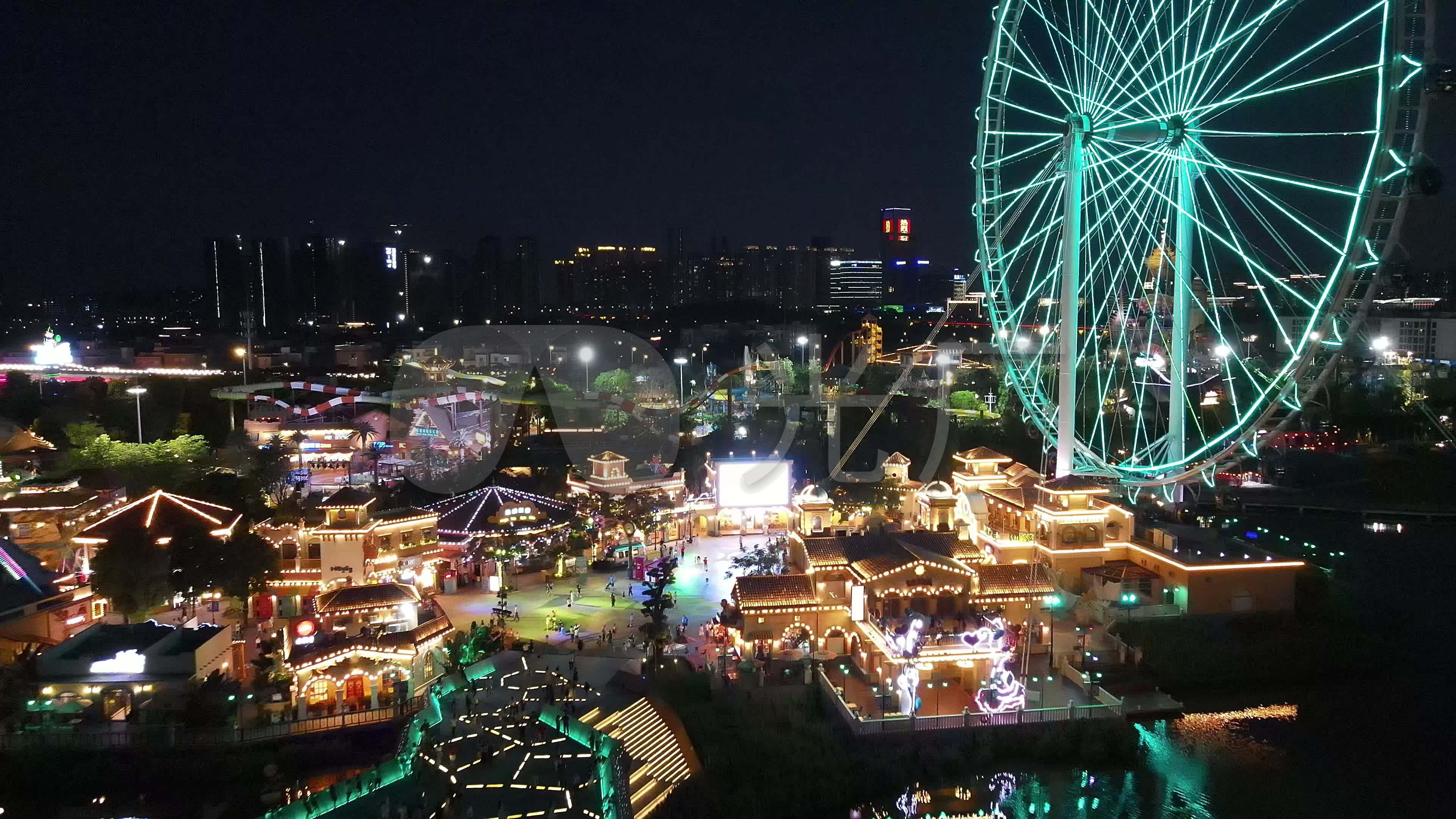 佛山顺德华侨城欢乐海岸游乐场夜景航拍_3840x2160_高清视频素材下载