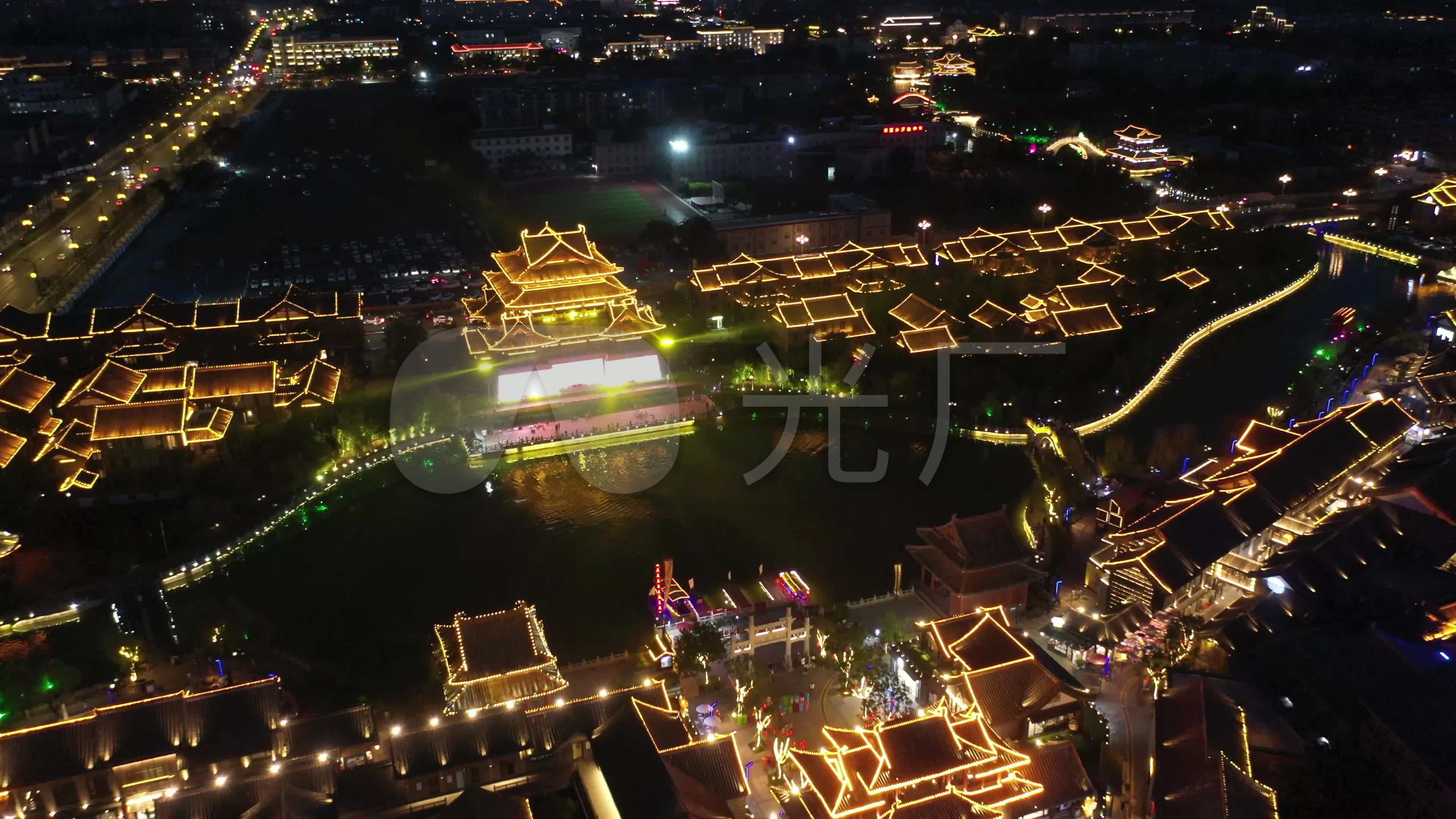 航拍河南开封清明上河园夜景_3840x2160_高清视频素材下载(编号