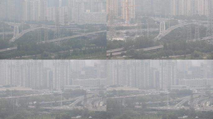 雾霾下的北京国贸大望路立交桥车流
