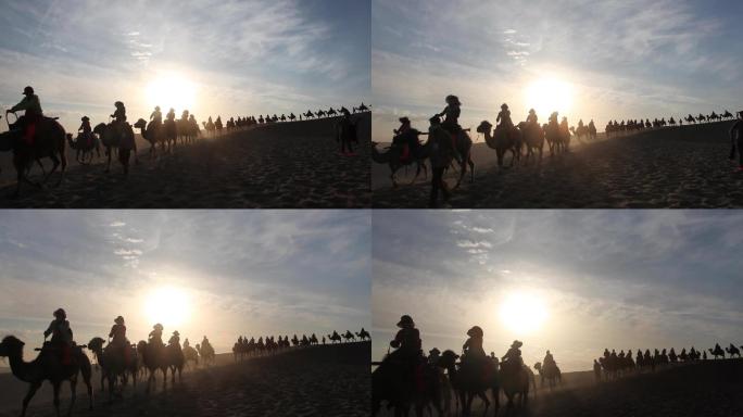 沙漠夕阳下的骆驼队
