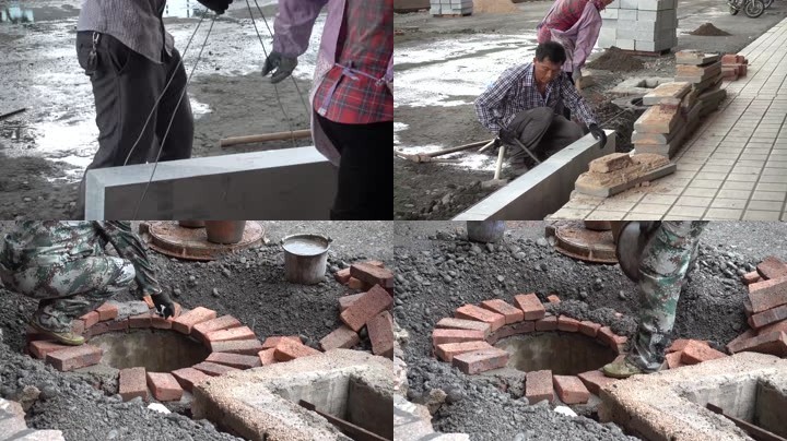 道路施工现场农民工筑路工人下水管口水泥罐