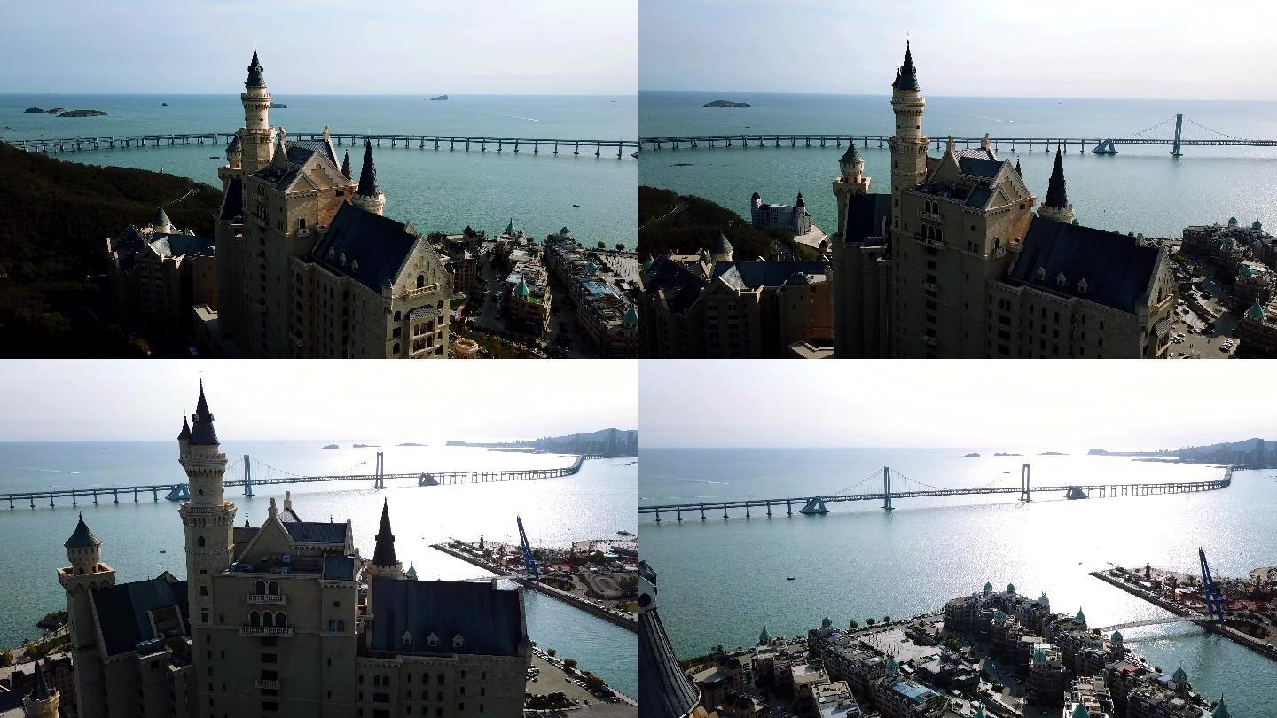 4K航拍城市海岸城堡平静海面跨海大桥