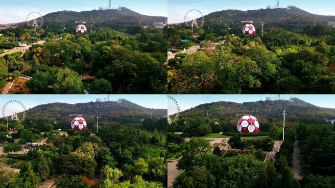 4K航拍城市公园景观雕塑足球