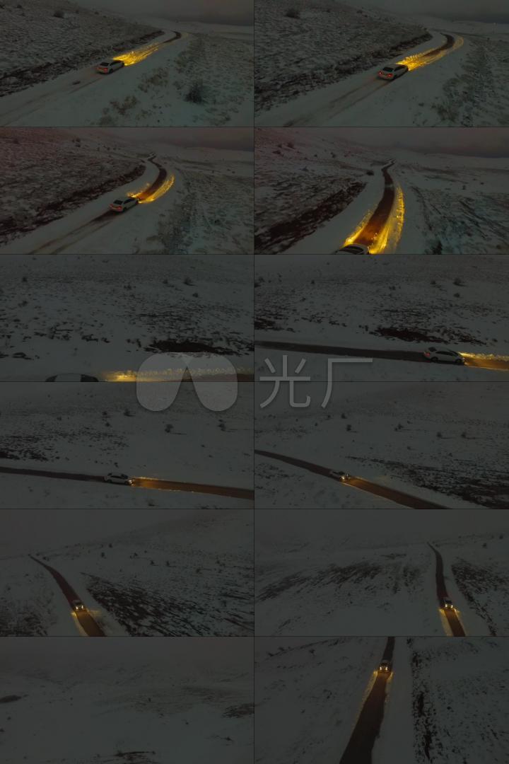 雪夜山间公路行使的汽车
