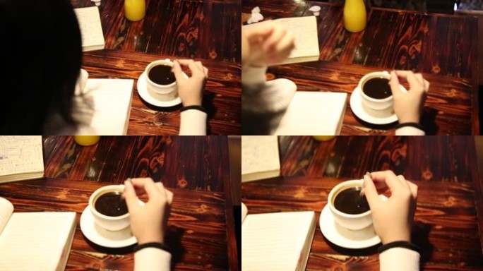 漂亮的手搅拌咖啡素材