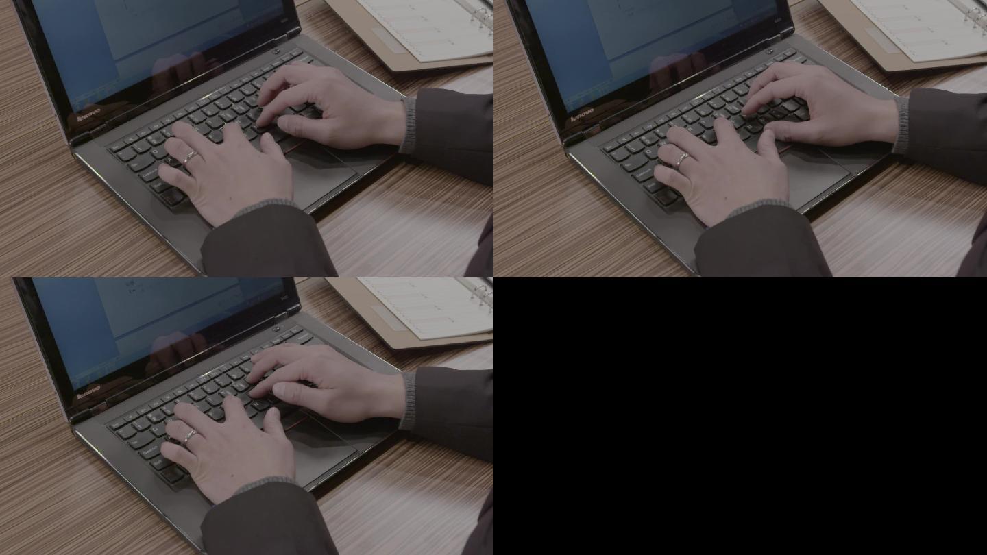 手指操作笔记本电脑特写