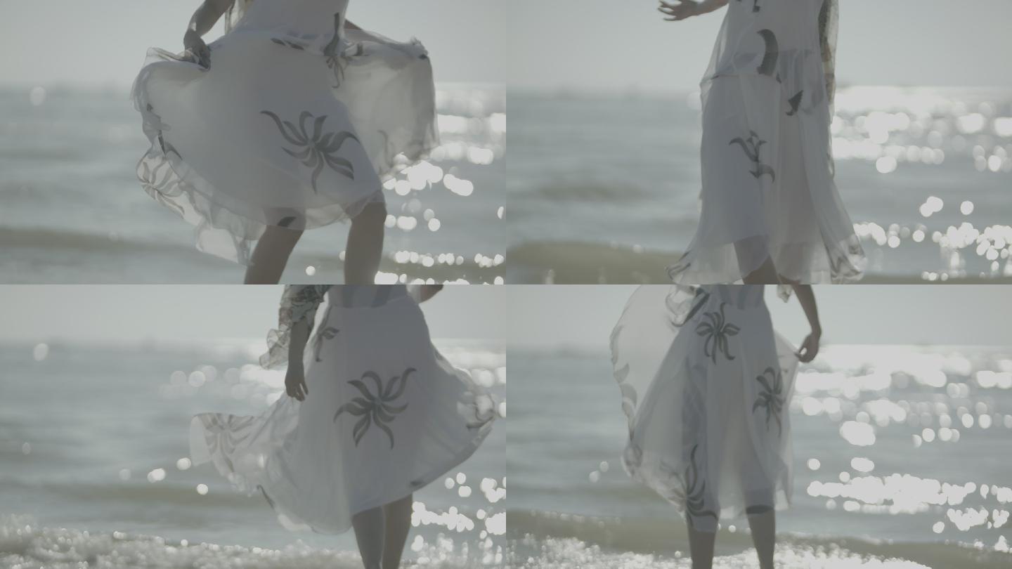 美女阳光海滩玩耍跳舞带灰度原始素材