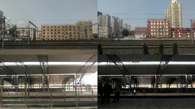 动车驶入沈阳北站火车窗外建筑风景