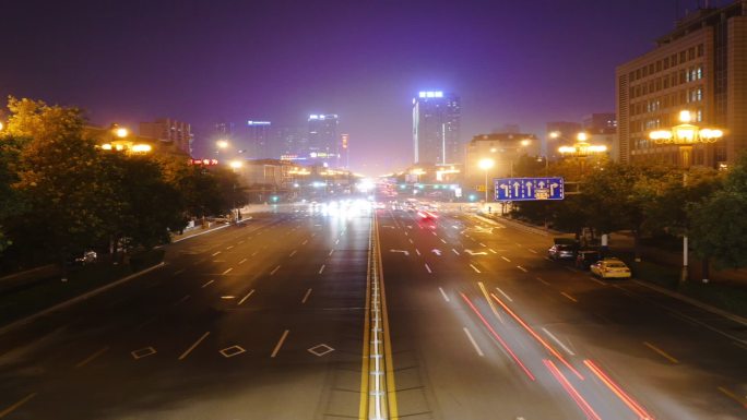 城市唐山街道车辆夜晚延时摄影