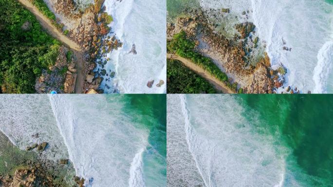 海边风景三亚湾海南海浪天空礁石