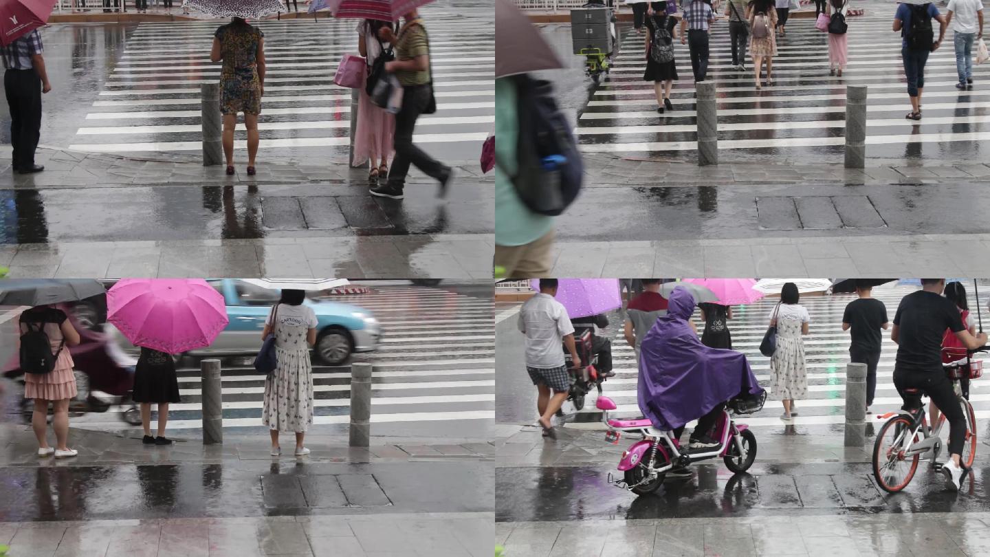 广州天河雨中匆忙的市民穿过斑马线2018