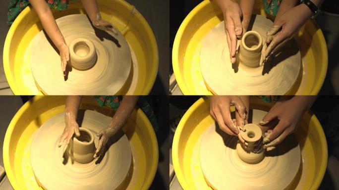 大人帮助儿童做陶艺双手的一组特写