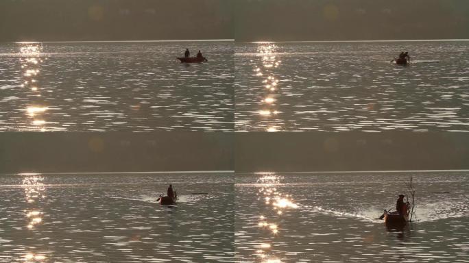 实拍夕阳落日湖面渔船