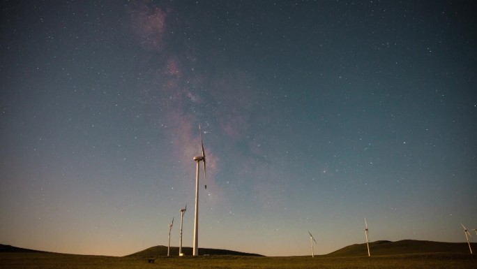 风车银河夜晚星空环保节能绿色延时摄影