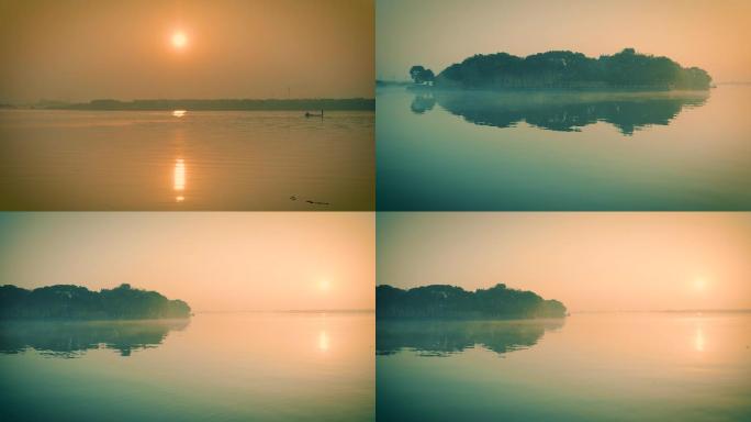 清晨雾气缭绕的湖面和寺庙