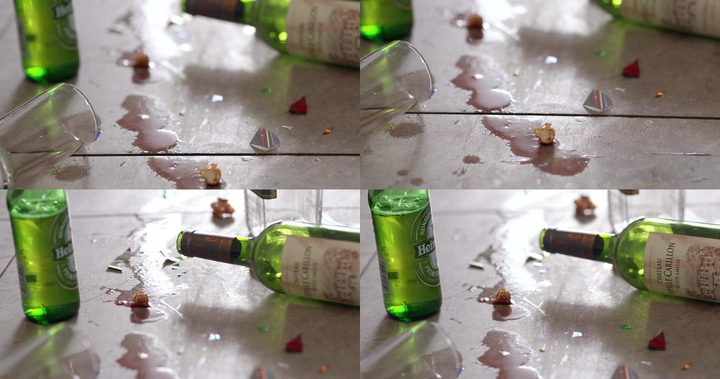 脏乱的木质地板上倒下的啤酒瓶