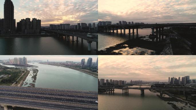 夕阳西下的福建泉州晋江上高速路桥世贸大厦