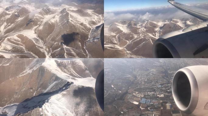 飞机上拍摄雪山及云层