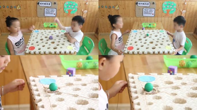 幼儿玩游戏之一起拉小球实拍视频
