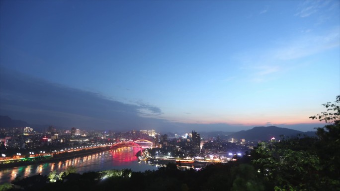 宜宾延时实拍日转夜景点地标车流