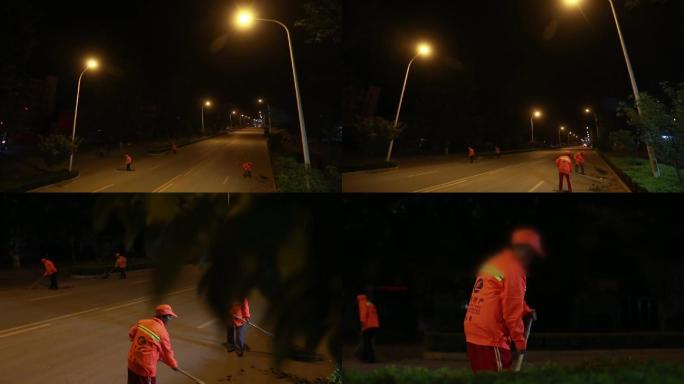 夜幕下的环卫工人打扫马路
