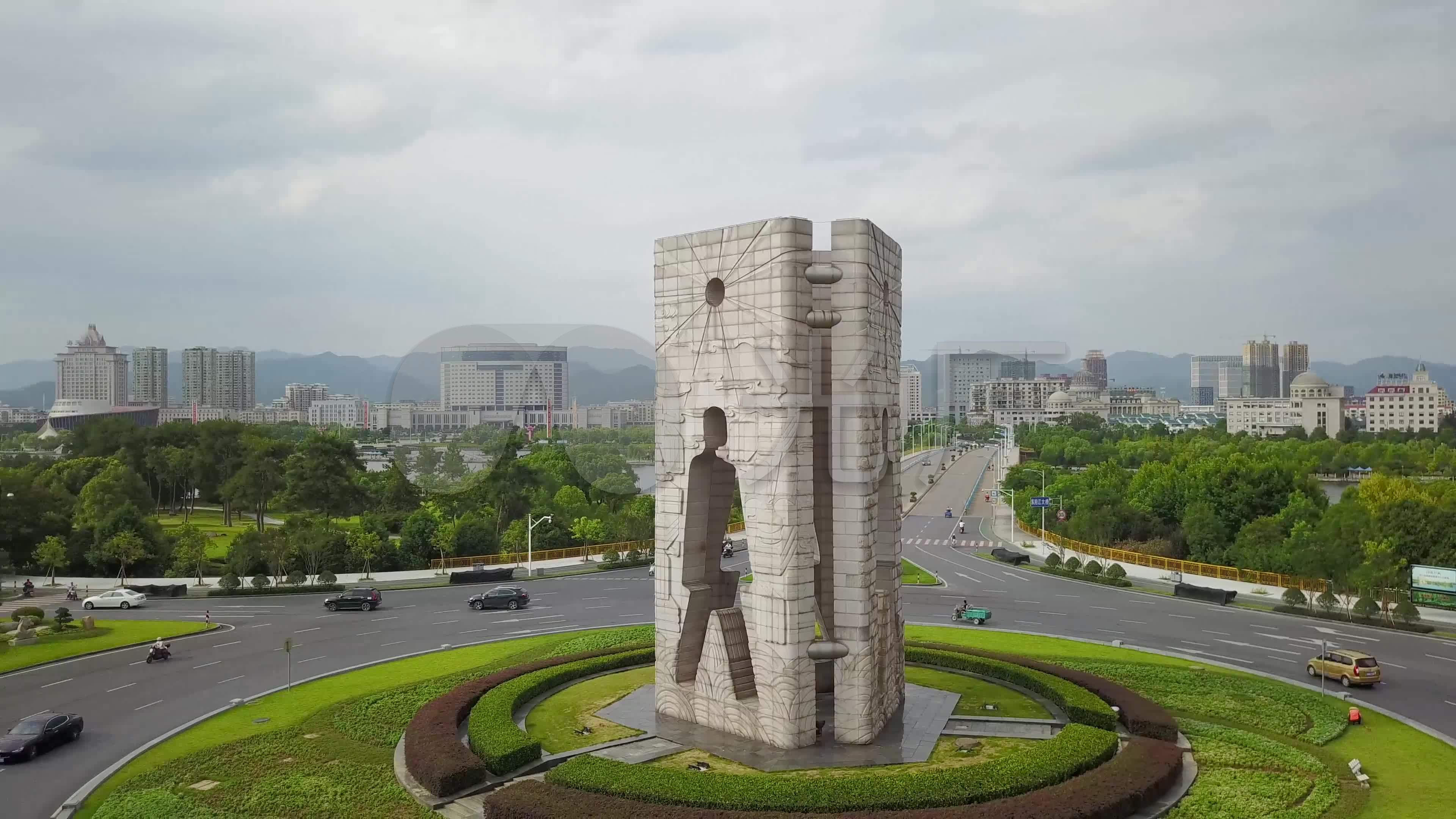 东阳航拍东阳人雕像市政府大楼城市街景公路_3840x2160_高清视频素材
