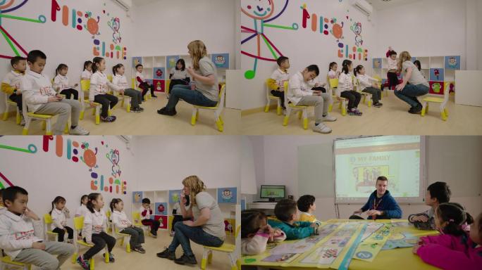 外国人男女外教给小朋友儿童上课讨论