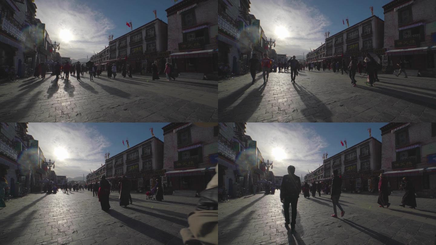 西藏拉萨人流剪影慢动作逆光藏族街道大昭寺