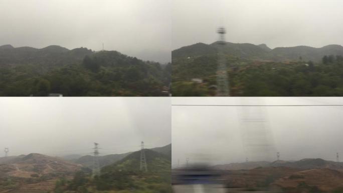 火车窗外车窗外山村云雾缭绕楼房