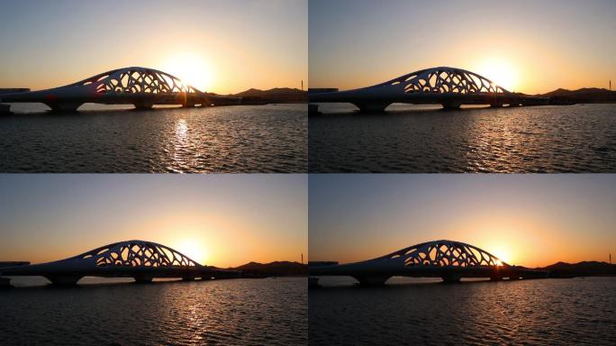青岛西海岸新区珊瑚贝桥远景延时日落