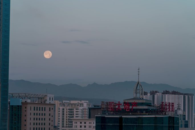 甘肃兰州亚太地产月落延时摄影